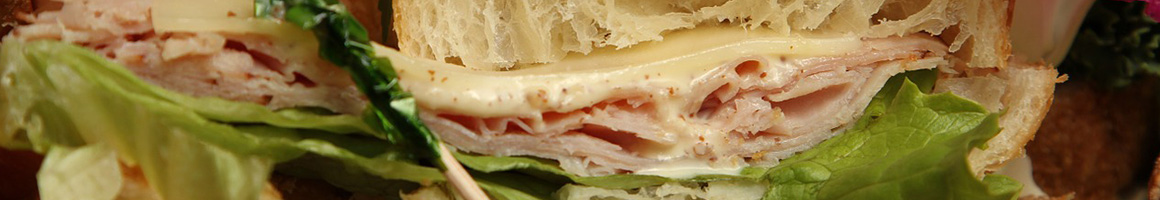 Eating Sandwich at Giamela's Submarine Sandwiches restaurant in Burbank, CA.